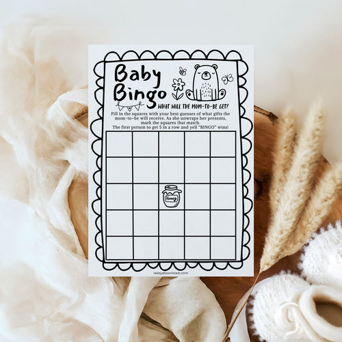 Baby Bingo game card on a soft fabric background