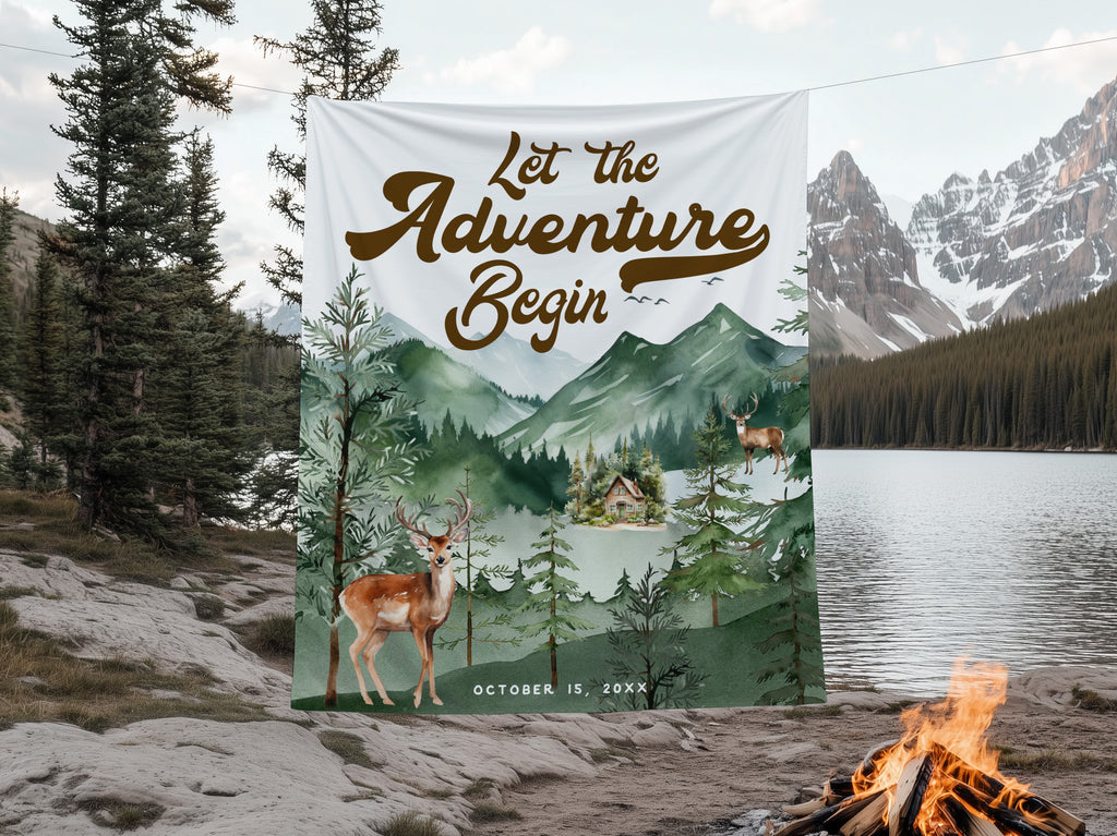 Decorative banner with 'Let the Adventure Begin' text in a scenic outdoor setting with mountains and lake.