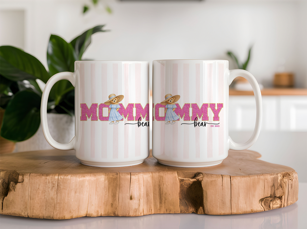 Chic white mug with "Mommy Bear" text and a charming pink mama bear graphic, perfect for new moms who love a touch of class. Double sided same design.